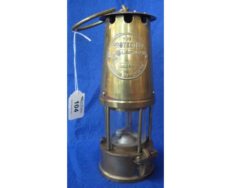The Protector Lamp and Lighting Company Limited brass miner's safety lamp.