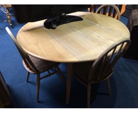 An Ercol Golden Dawn drop leaf table, with four hoop back chairs