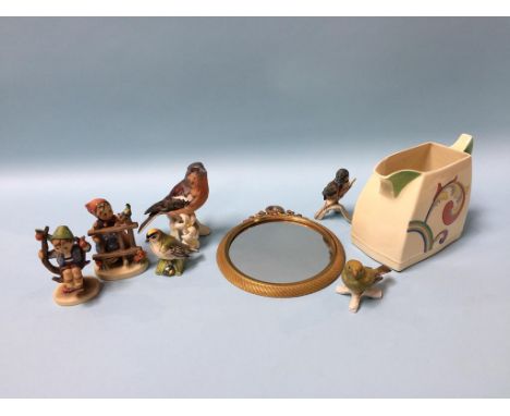 A Royal Doulton water jug, Syren, D5102, No. 764873, two Hummel figures and three Goebel birds etc.
