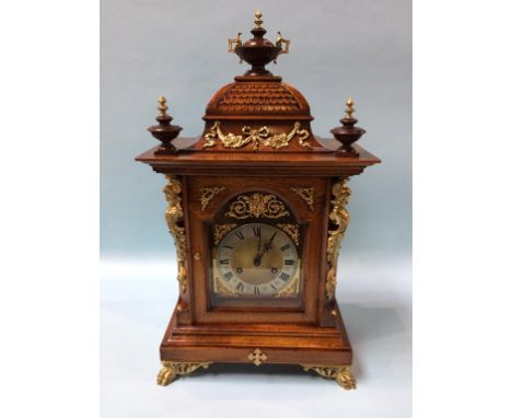 A walnut cased bracket clock, with 8 day movement and strike action, 55cm height