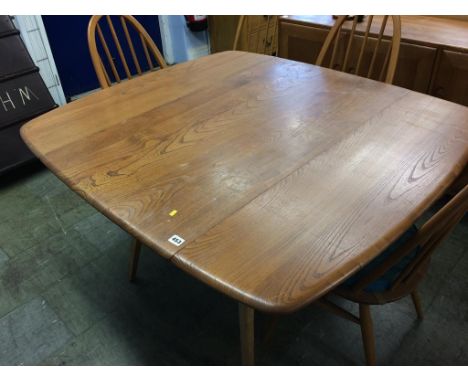 An Ercol Golden Dawn drop leaf table