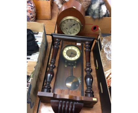 A mantle clock and a wall clock