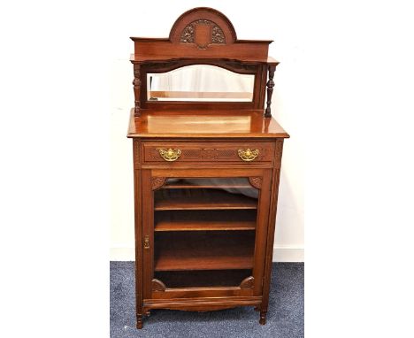 EDWARDIAN MAHOGANY MUSIC CABINETthe shaped carved and raised back with a bevelled mirror above a carved frieze drawer, with a