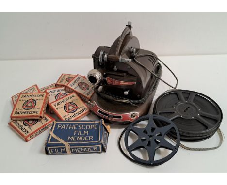 CINEMATIC INTERESTa Pathescope Gem projector, together with two Pathescope 9.5mm films 