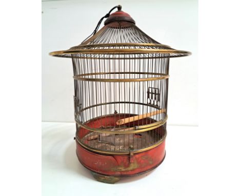 VINTAGE BRASS PAINTED BIRD CAGEby the Art Cage Manufacturing Company, of circular pagoda form with suspension loop and pull o