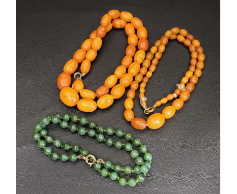 TWO GRADAUTED BUTTERSCOTCH AMBER BEAD NECKALCESone 43cm long and approximately 22.9 grams, and the other 41cm long and approx