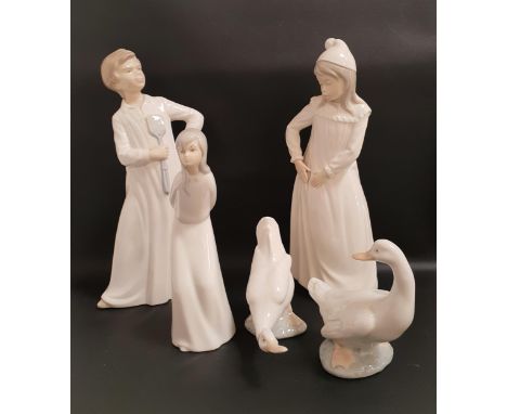 FOUR NAO FIGURINEScomprising boy with a fly swatter, 29cm high, girl with a torn nightgown, 29cm high and two ducks, 12cm and