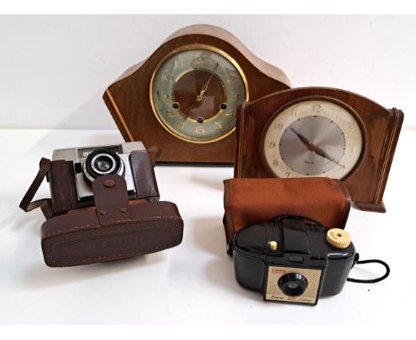 TWO CLOCKS AND TWO CAMERAScomprising a Westminster chime mantel clock, a Westclox mantel clock, a Kodak Brownie 127 camera in