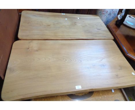 Two 1m similar handmade light elm refectory style tables with rustic edges, shaped standard ends and pegged stretchers