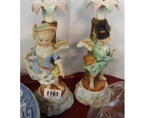 A pair of Sitzendorf porcelain figural candlesticks - a/f