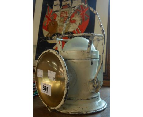 A vintage two way battery lamp