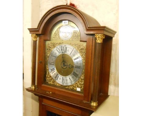 A 20th Century reproduction mahogany longcase clock, the 30cm arch dial marked for retailer Richard Buad, Bodmyn, Cornwall wi