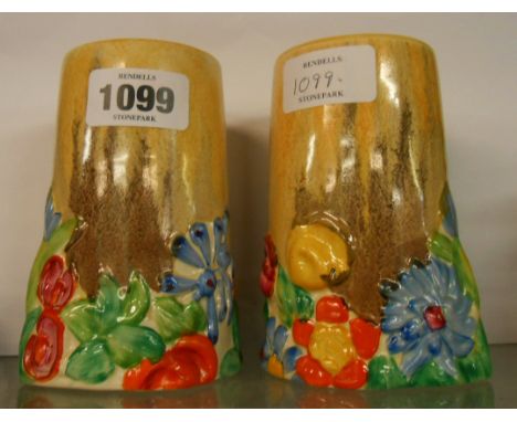 A pair of Clarice Cliff Bizarre My Garden vases with moulded and painted design