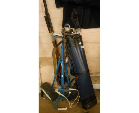 A golf caddy bag containing various clubs