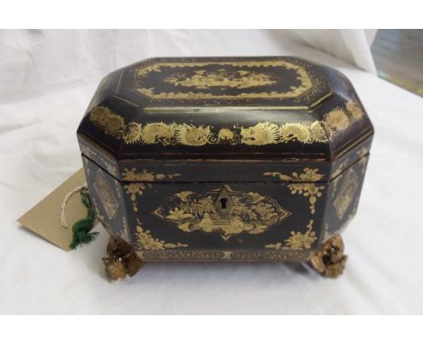 An antique chinoiserie twin compartment tea caddy with metal canisters and ormulu mounts