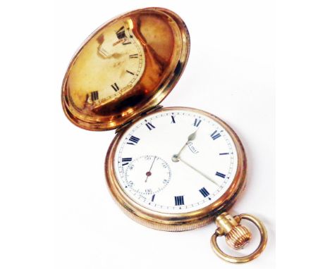 A 9ct. gold cased hunter pocket watch with engine turned decoration and Limit lever movement