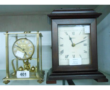 A vintage Kein brass and glass oblong cased anniversary clock with ball pendulum - internal chip to front glass - sold with a
