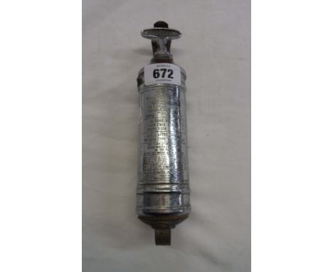 A vintage chrome plated Minimax car fire extinguisher