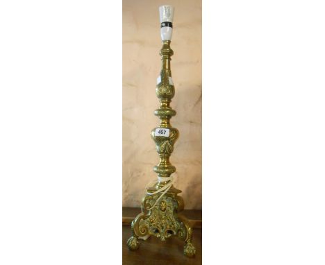 A large brass candlestick form table lamp