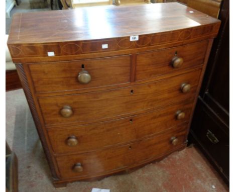 A 1.02m 19th Century mahogany and strung bow front chest of two short and three long graduated drawers, set on reduced bracke