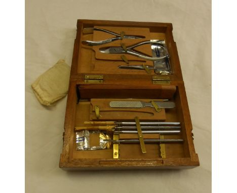 A set of chiropodist's instruments in War Department box - instruments marked with the Broad Arrow