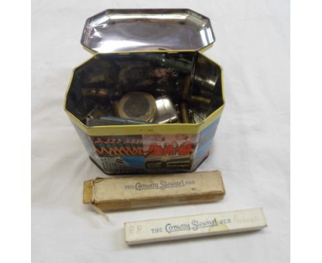 A vintage Butlins tin containing Platignum and Conway Stewart pens, Trench Art and other collectable lighters