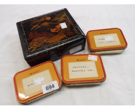 A small Japanese lacquered box containing sewing items - sold with cufflinks, rosette, etc.