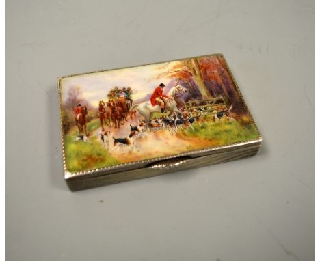 AN ENGINE TURNED SILVER SNUFF BOX, with enamelled panel to hinged lid depicting huntsmen with hounds in countryside with figu