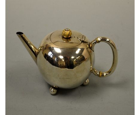 A SILVER TEAPOT, of globular form on three ball feet, London 1883, Edward Hutton, approximately 7.9ozt