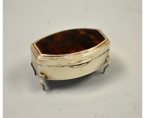 A SILVER RECTANGULAR TRINKET BOX, with tortoiseshell panel to hinged lid set on cabriole legs, Birmingham 1945, approximately