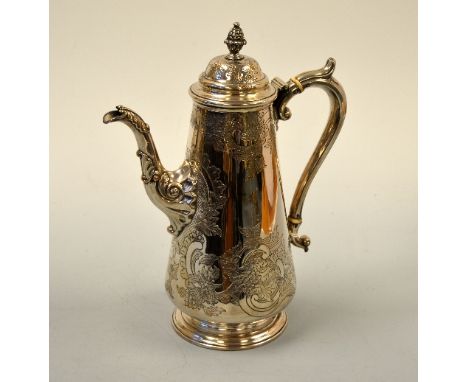 A GEORGIAN PLATED COFFEE POT, with embossed scroll spout, engraved floral decoration to body and acorn finial, approximately 