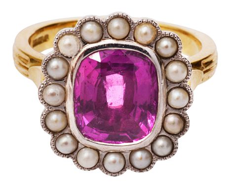 A pink sapphire and pearl cluster ring, the cushion-shaped pink sapphire collet-set to the border of half pearls, with navett