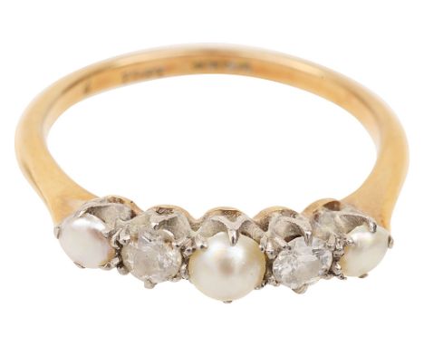 A pearl and diamond ringthe three graduated half pearls separated by a brilliant-cut diamond, the tapering shank stamped '18'
