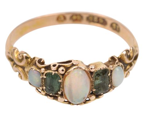 A mid 19th century 15ct yellow gold, opal and green stone five stone ring,the central oval opal cabochon  with a foiled green