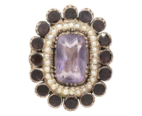 An amethyst, garnet and seed pearl cluster ringthe central shaped rectangular amethyst to the surround of seed pearls and out