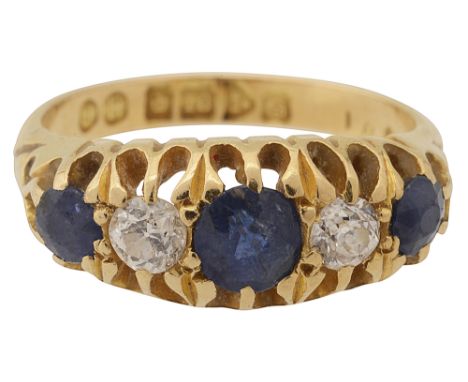 An Edwardian sapphire and diamond five stone ring,three circular cut sapphires each separated by an old brilliant-cut diamond