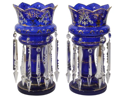 A pair of Victorian blue glass lustre vasesdecorated with gilt and enamel flowers vase and garlands, suspending two tiers of 