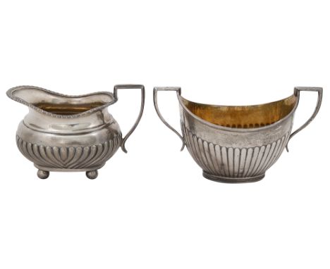 A Late Victorian silver cream jug and and a twin handled sugar basinfirst Birmingham, 1900 by Barker Brothers, of oblong bell