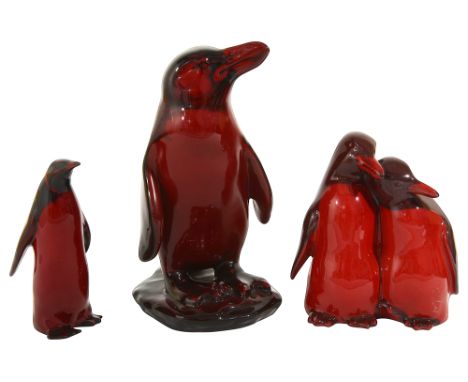A Royal Doulton Flambe Peruvian penguin, designed by Charles Noke, bearing stamp to base and signature, together with a Royal