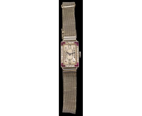 A lady's 18ct white gold and diamond-set cocktail wristwatch, the rectangular dial with Arabic numerals to the single-cut dia
