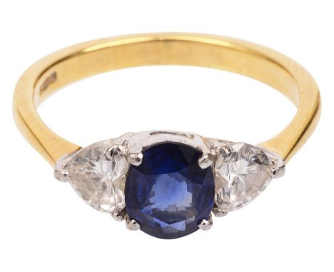 A sapphire and diamond three stone ringthe central oval mixed-cut sapphire with a heart-shaped brilliant-cut diamond to eithe