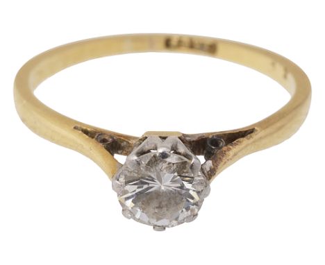 A diamond single stone ring, the brilliant-cut diamond coronet-set to the  plain tapering  shank stamped '18CT'ring size K1/2