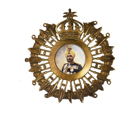 Bhupinder Singh of Patiala. An early 20th Century silver-gilt and enamel turban badgeBirmingham, 1926 by Goldsmiths & Silvers