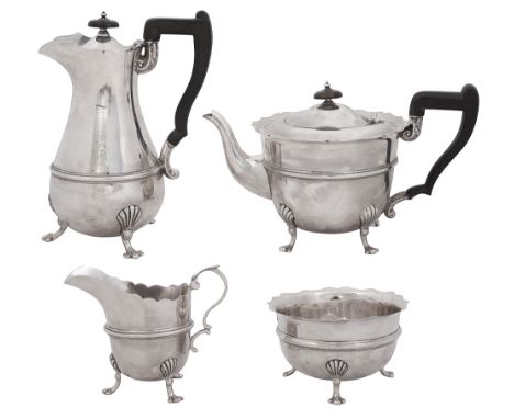 A George V silver four piece tea serviceSheffield, 1919 by Lee &amp; Wigfull of plain tapering design with a moulded girdle a