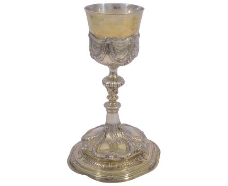 An early 18th century German parcel-gilt chalice cupmarked for Augsburg 1736-7, makers mark IAS embossed with floral medallio