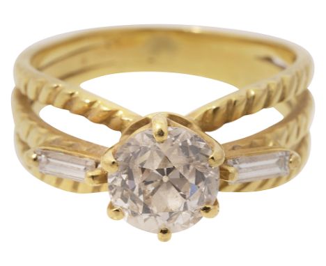 A diamond single stone ringthe old brilliant-cut diamond coronet-set above a baguette-cut diamond to either side  to the  orn