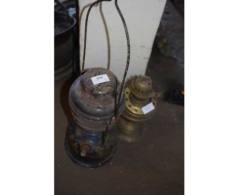 PARAFFIN LAMP AND AN OIL LAMP