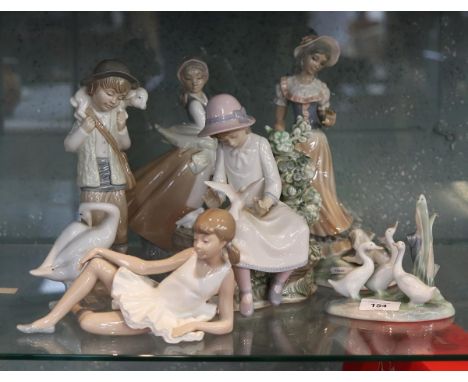 Collection of figurines to include Nao, Lladro etc 