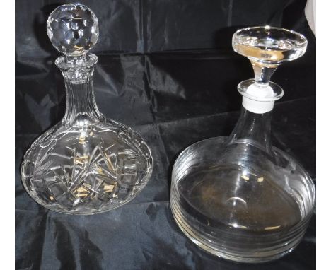 A pair of Dartington Glass decanters, together with a cut glass ship's style decanter and a cut glass fruit bowl, a box conta