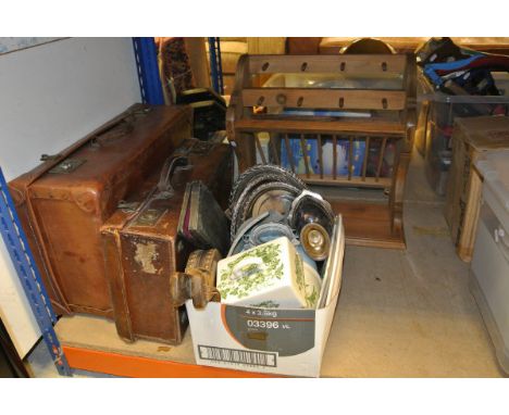 Two vintage leather suitcases, together with a pine wall-mounted plate rack and a box of sundry china to include storage jar,
